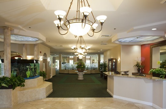 A lobby with a fish tank and aquarium.