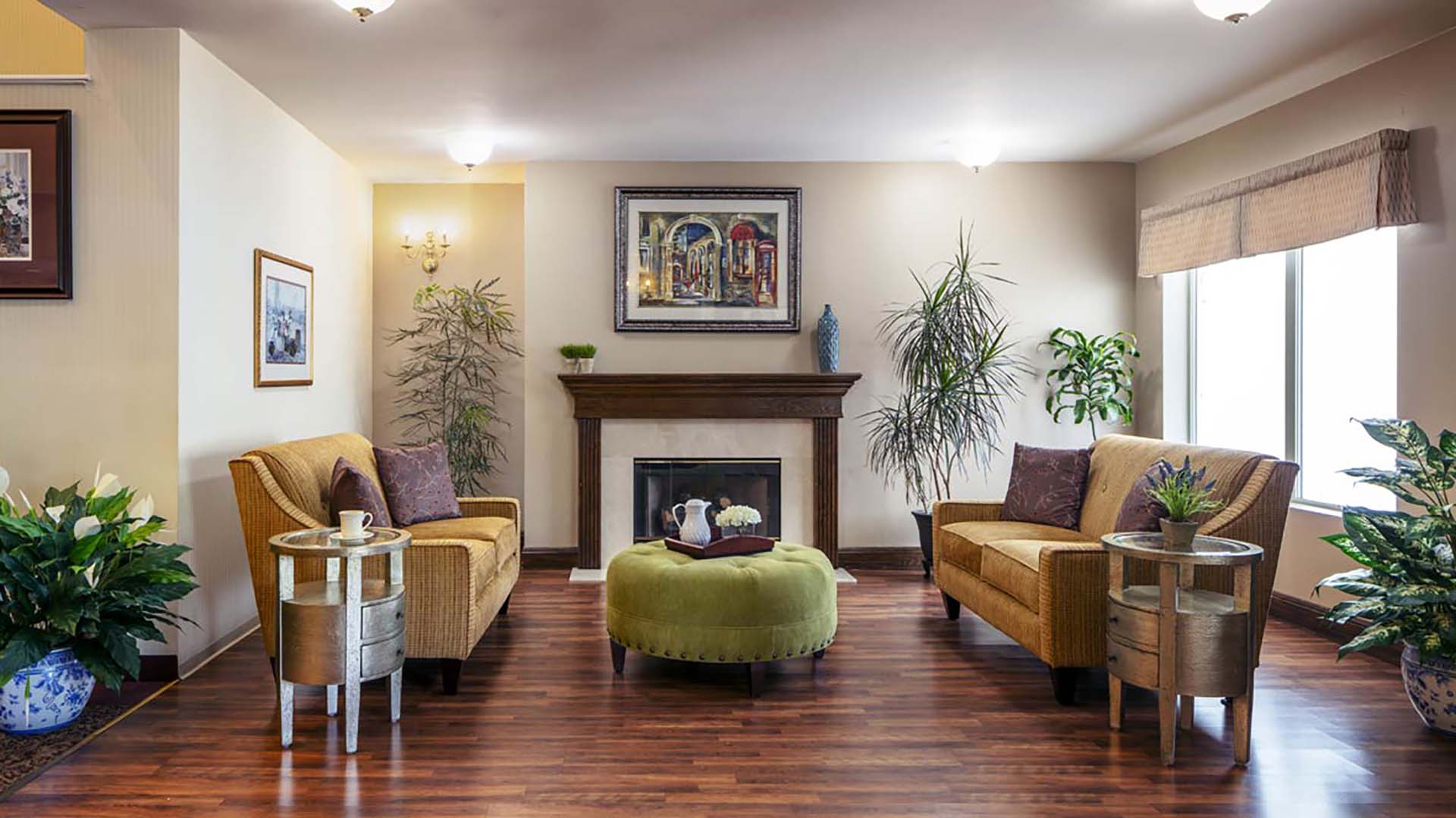 A living room with wood floors and furniture.