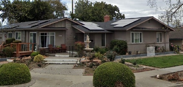 A house with solar panels on the roof.