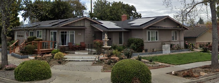 A house with solar panels on the roof.