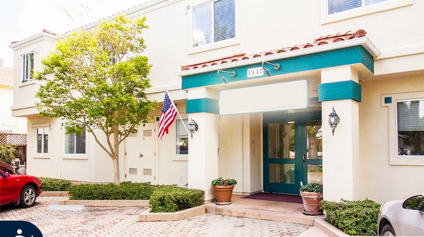 A building with an american flag on the front.