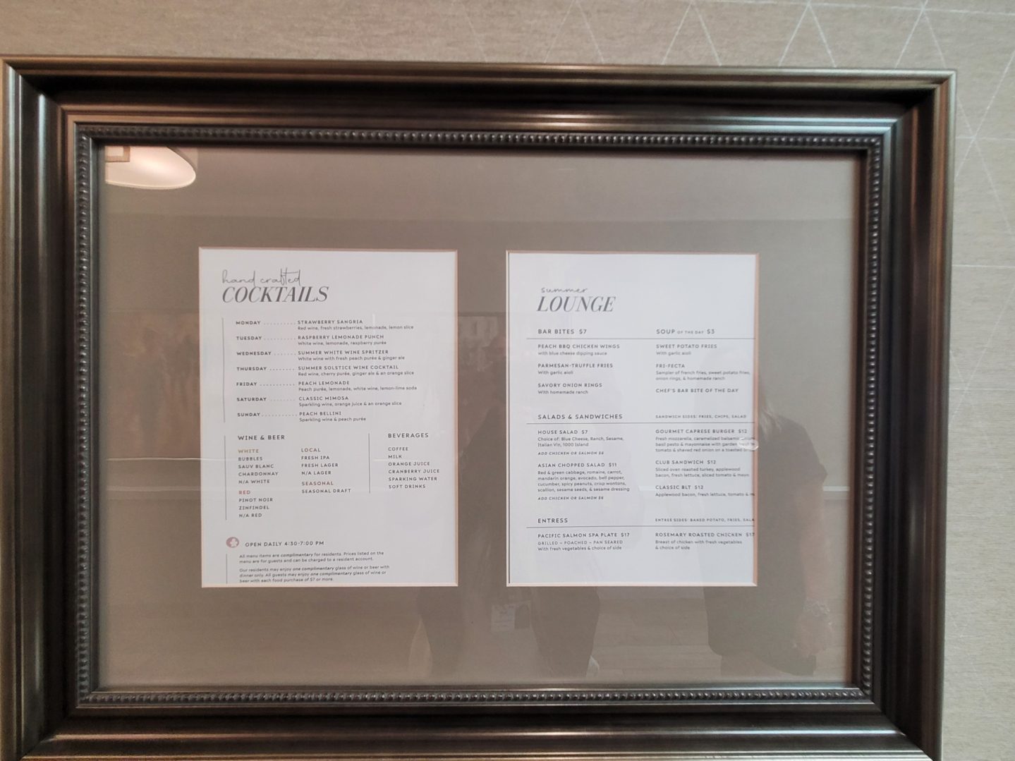 A framed menu of two different types of food.