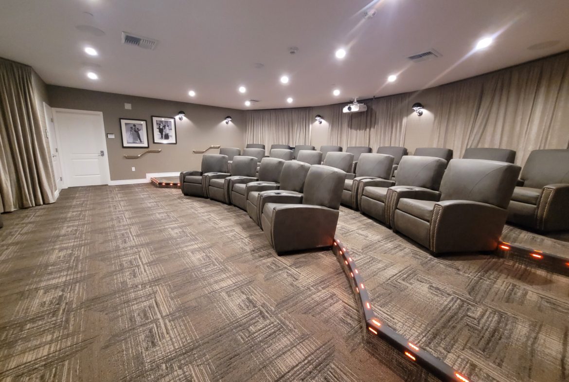 A large room with many chairs and lights