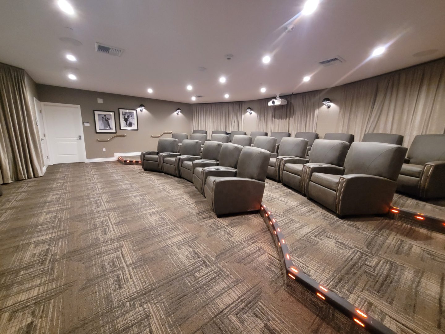 A large room with many chairs and lights