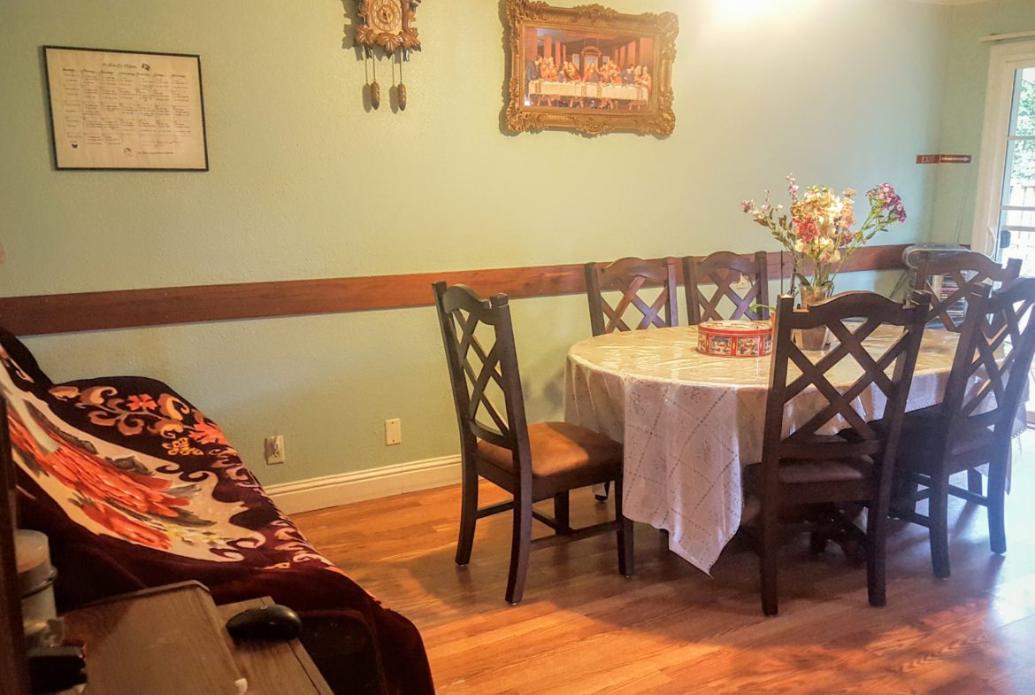 Dining room with table and chairs.