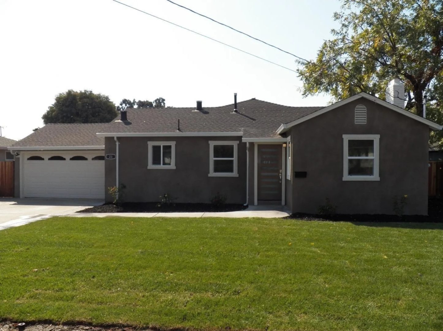Single-story house with attached garage.