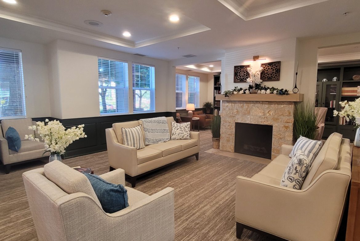 Cozy living room with modern fireplace.