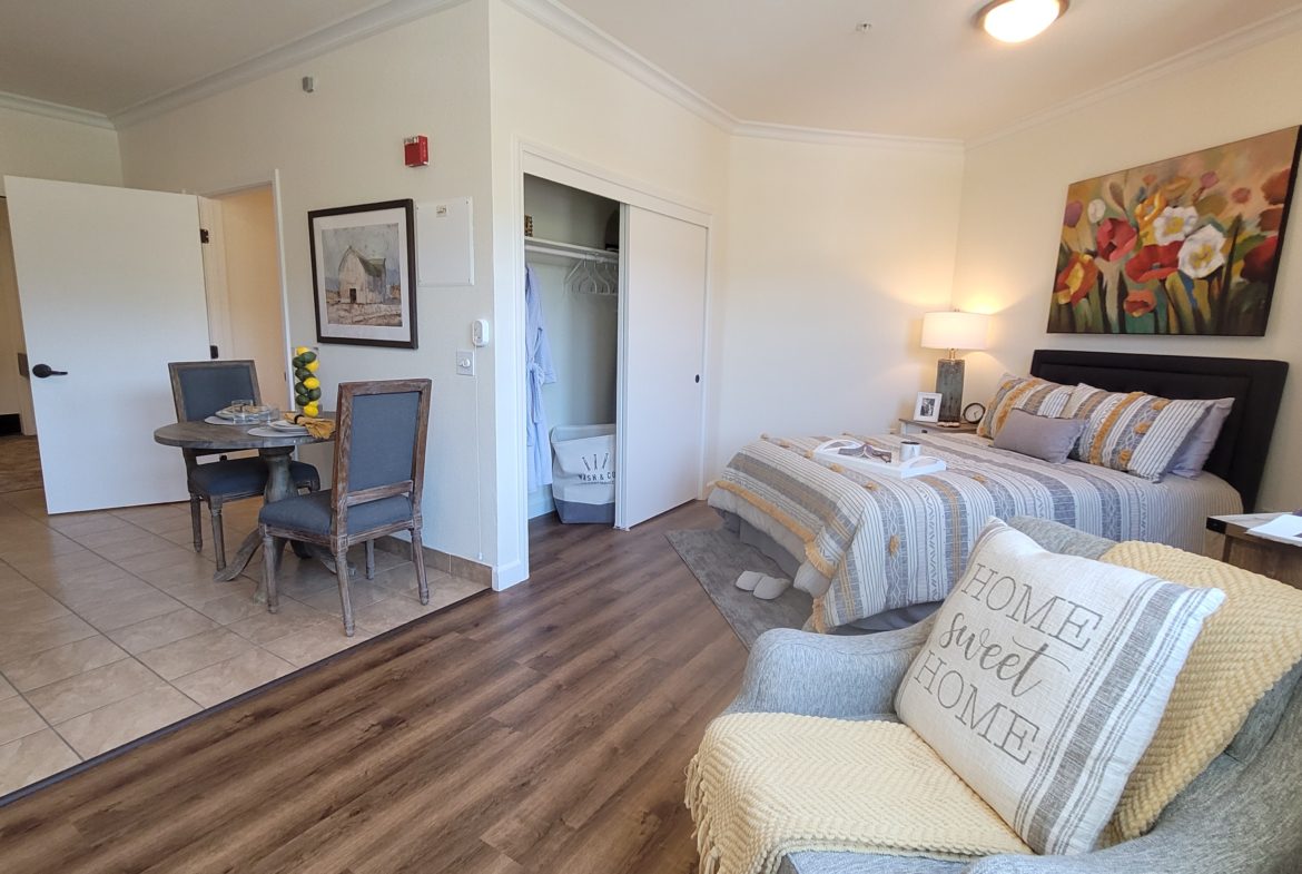 Cozy bedroom with dining area and decor.
