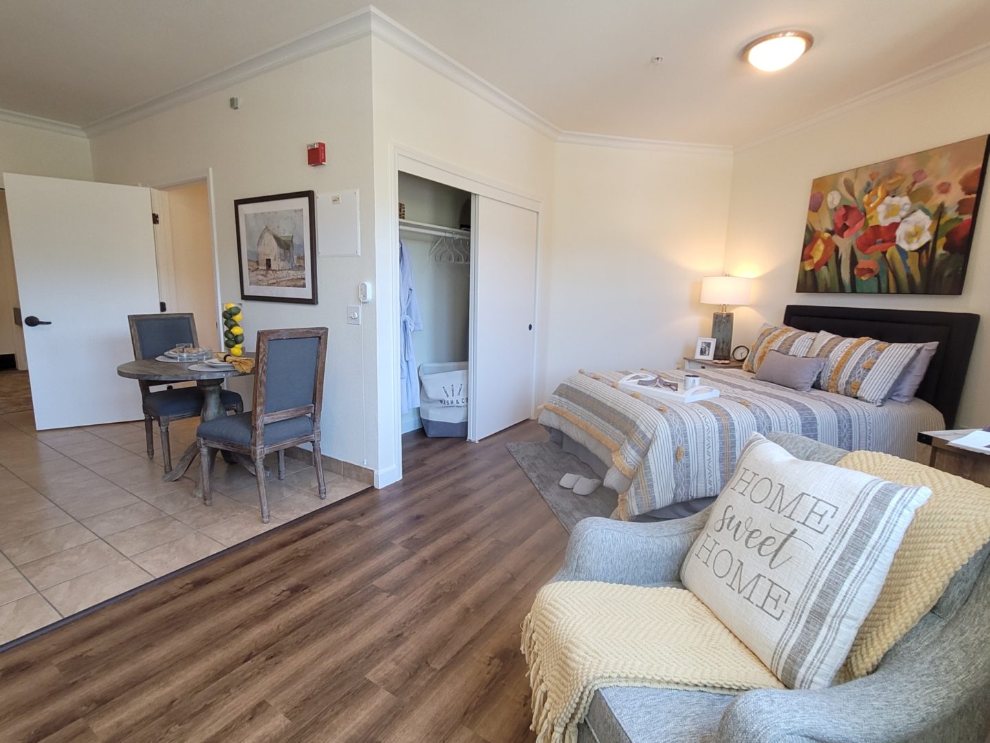 Cozy bedroom with dining area and decor.