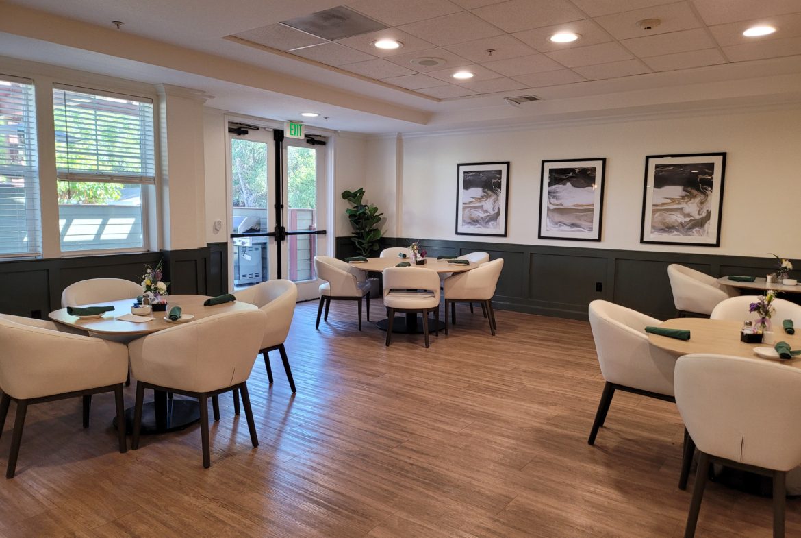 Empty restaurant dining area with elegant decor.