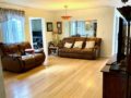 Cozy living room with leather sofas.