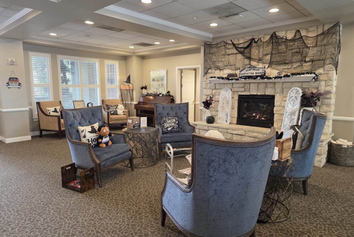 Cozy living room with blue chairs.