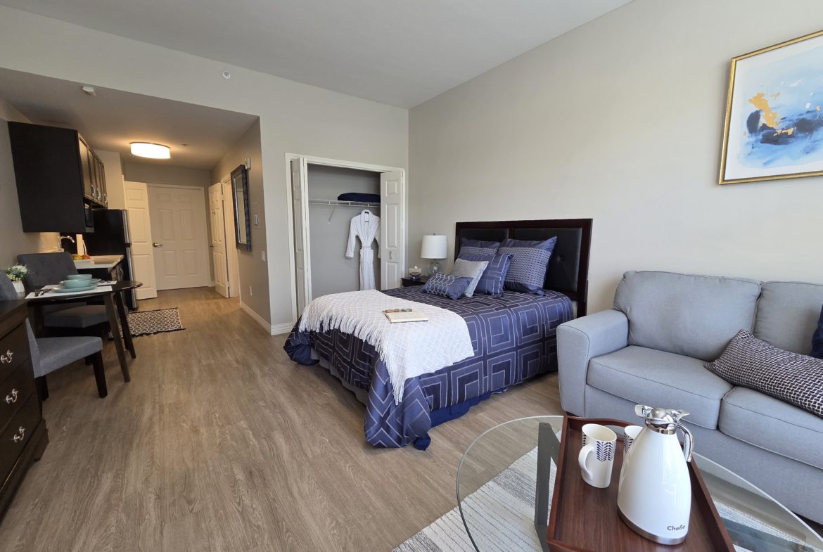 Cozy studio apartment with modern furnishings.
