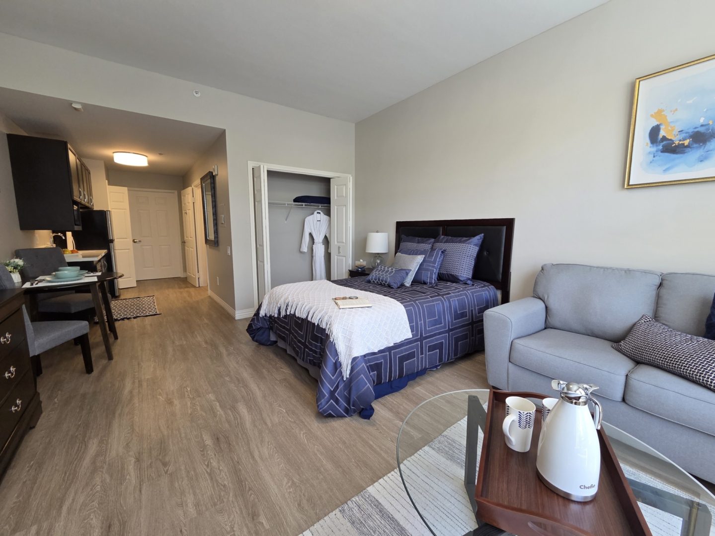 Cozy studio apartment with modern furnishings.