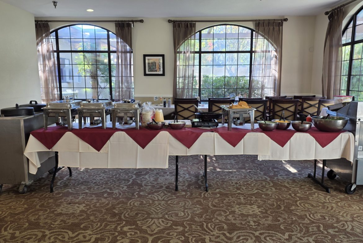 Buffet table setup in a dining room.