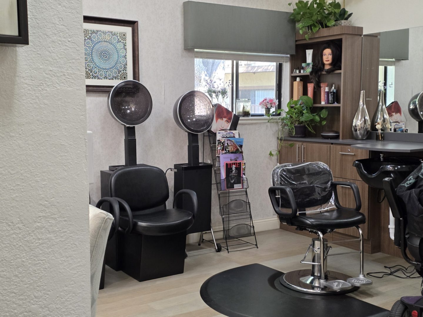 Hair salon interior with styling chairs.