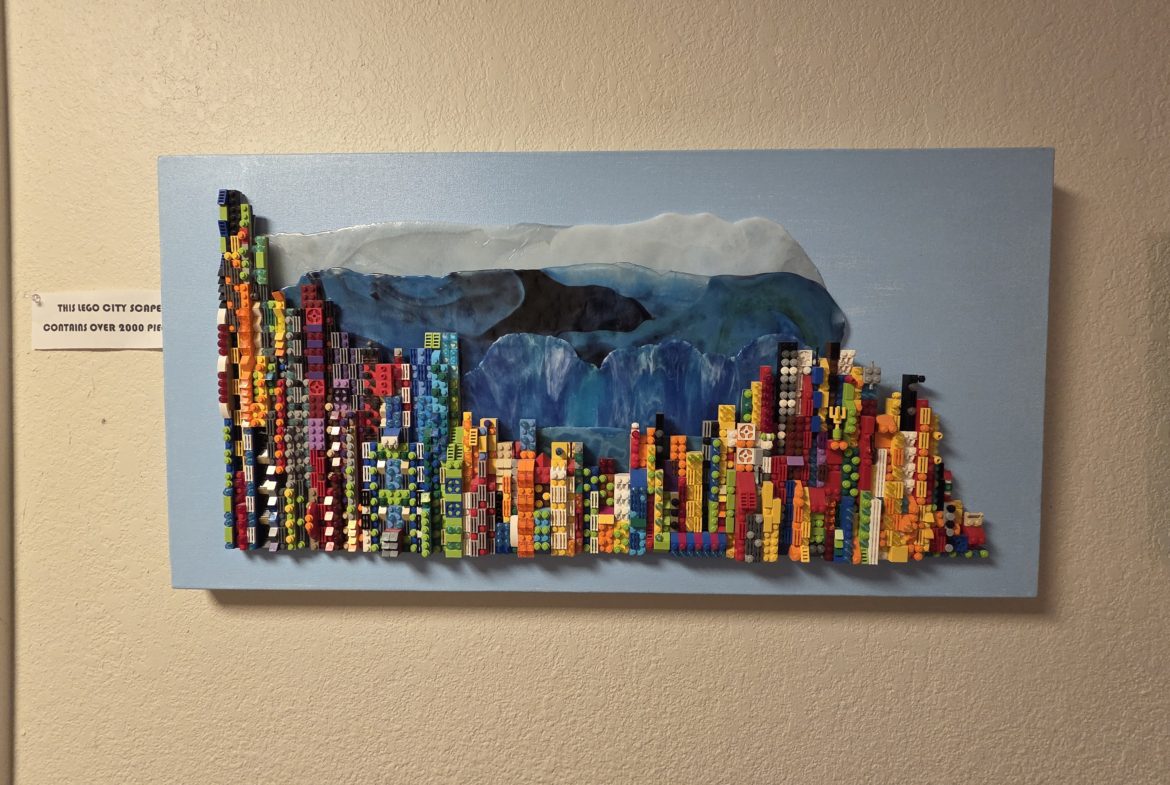 Colorful cityscape artwork with abstract mountain.
